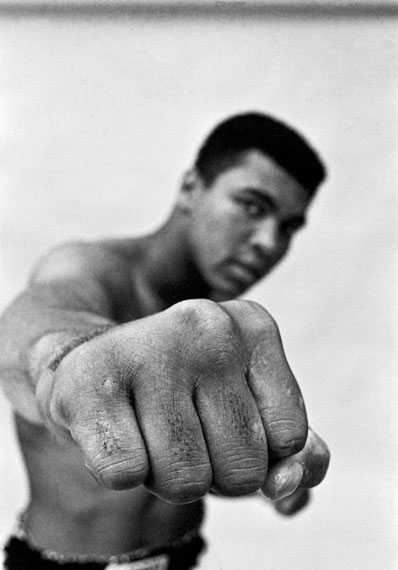 USA. Chicago 1966. MUHAMMAD ALI, boxing world heavy weight champion showing off his right fist.